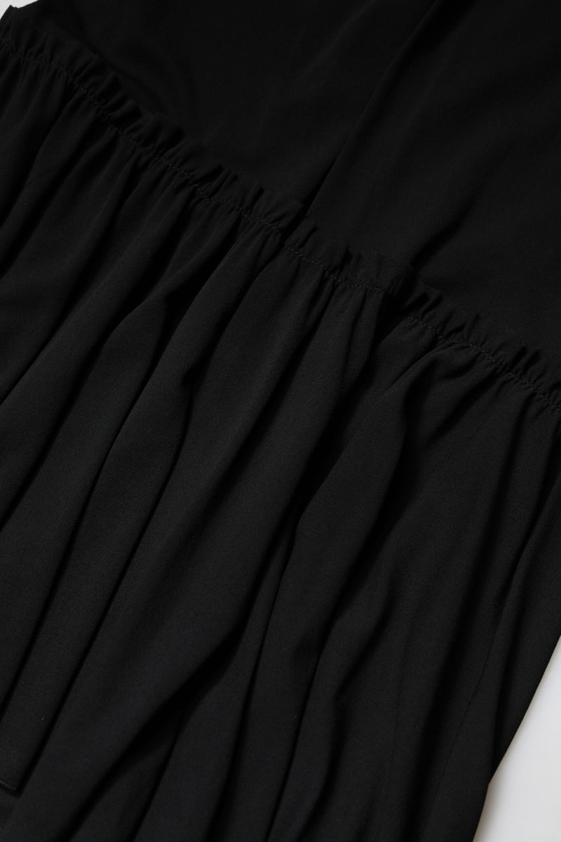 Black silk mermaid cut high waist midi skirt featuring gathered tiers