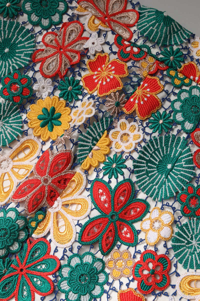 Multicolor floral lace mini skirt with red, yellow, green, and white embroidered flowers