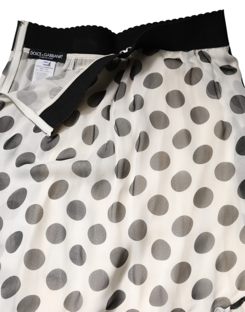 White silk skirt with black polka dots and a thick black waistband