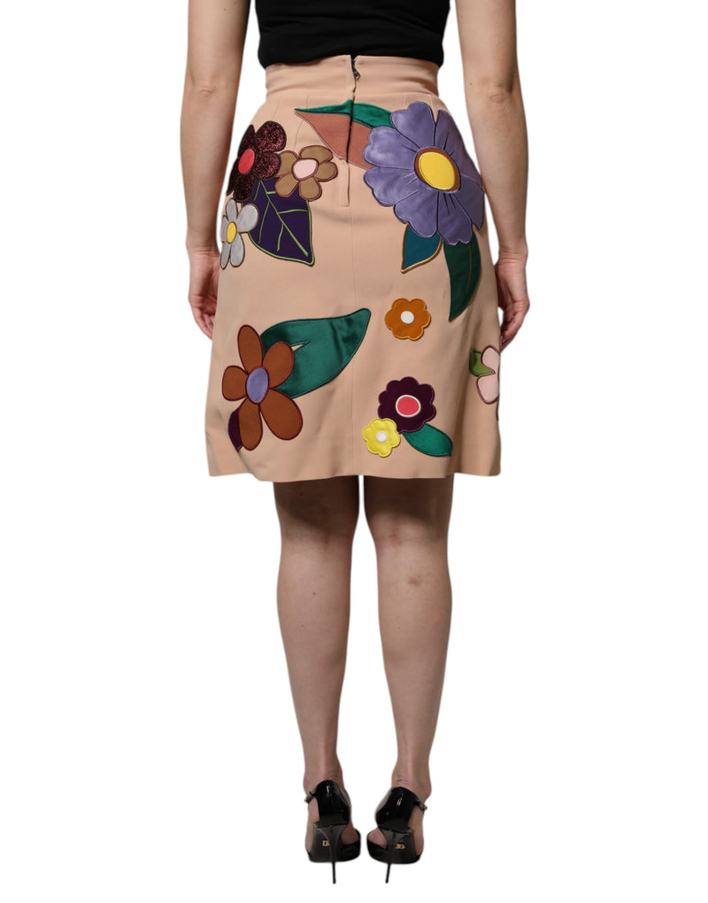 Beige high-waist pencil skirt adorned with colorful leather floral appliqués