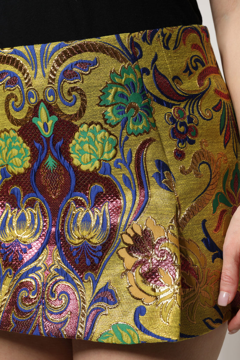 Multicolor floral jacquard mid-waist mini skirt with gold, blue, green, and burgundy pattern