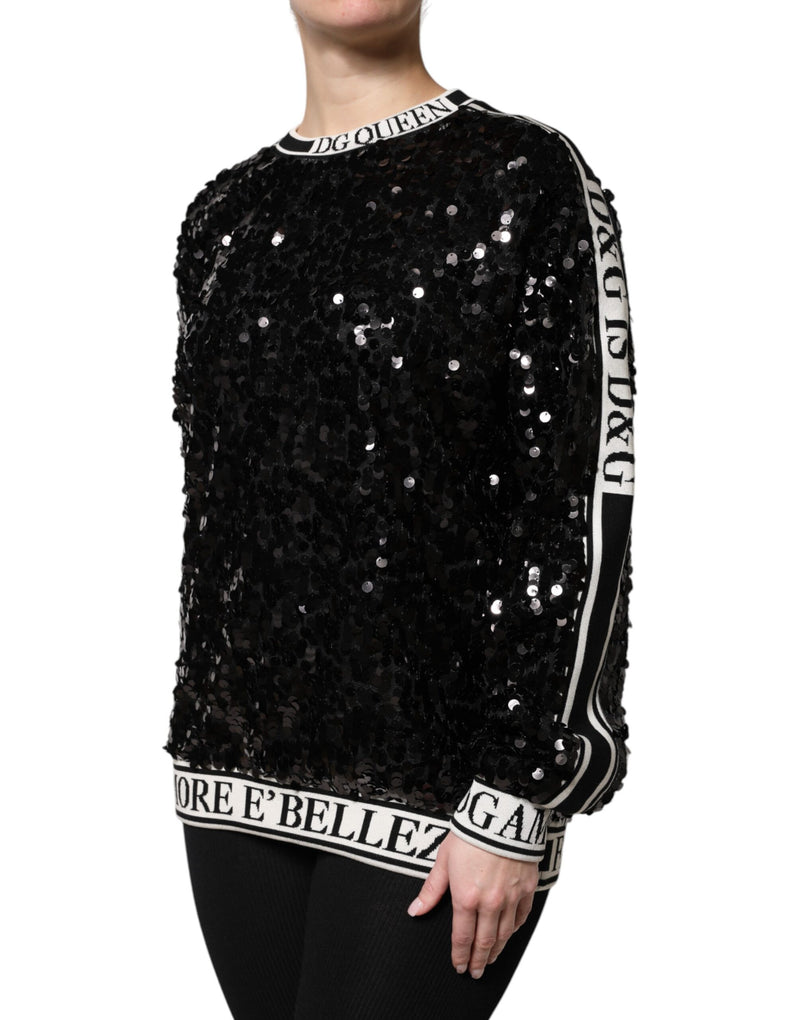 Black sequin pullover sweater with white brand lettering on ribbed trim and sleeves