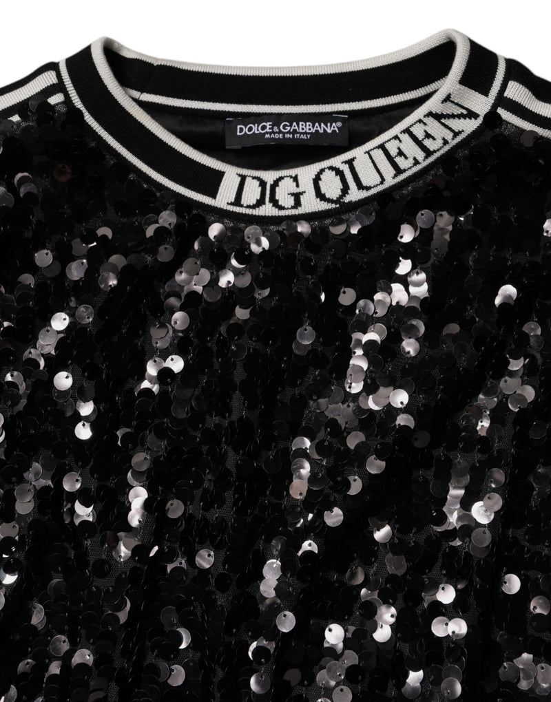 Black sequin pullover sweater with white striped ribbed collar and DG Queen text