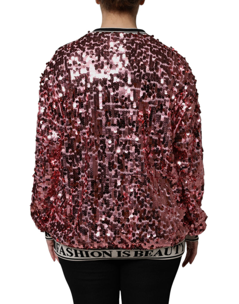 Pink sequin pullover sweater with striped collar and hem text