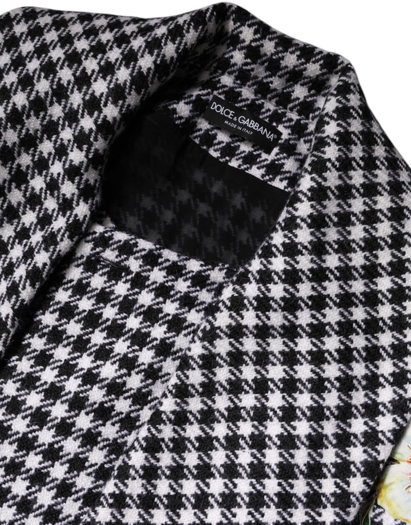 Black and white houndstooth wool cape jacket with Dolce and Gabbana brand label