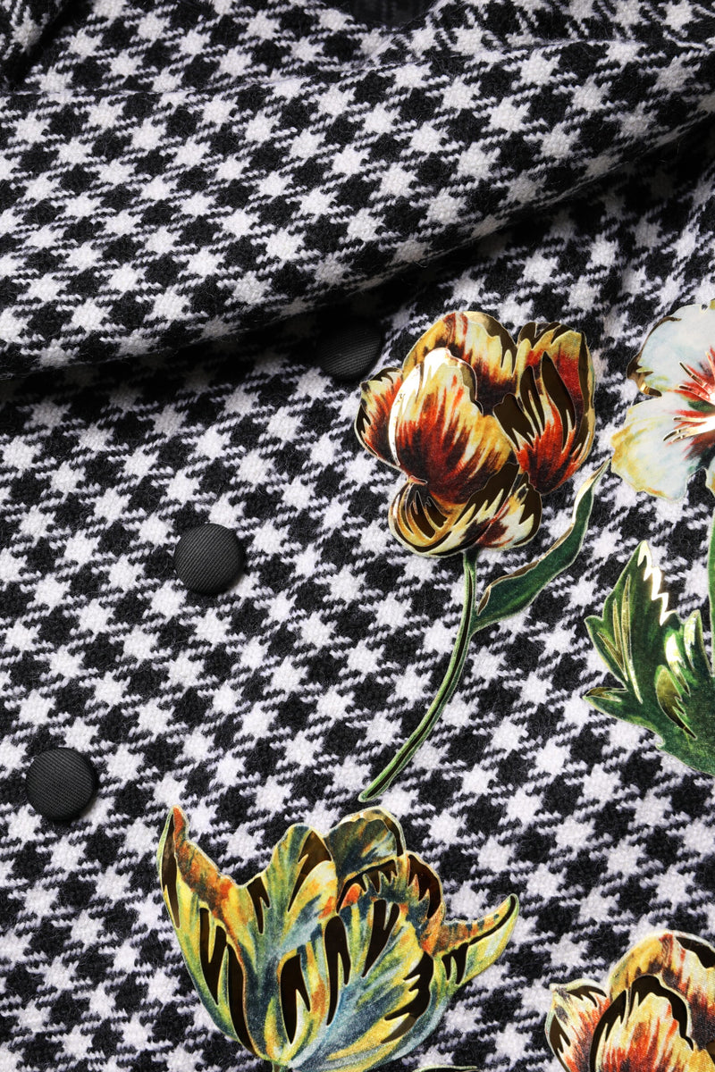 Black and white houndstooth wool cape jacket with metallic floral applique and black buttons