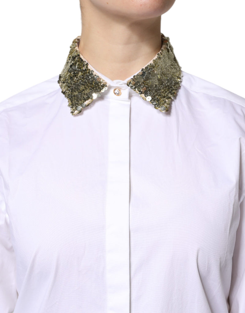White cotton button-up shirt featuring a sparkling gold sequin collar and crystal top button