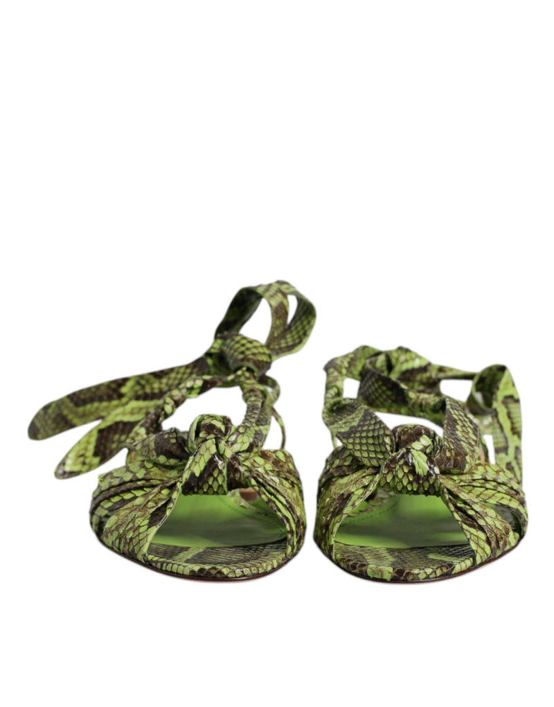 Dolce & Gabbana neon green and black snakeskin print ankle-wrap sandals with a front knot detail.