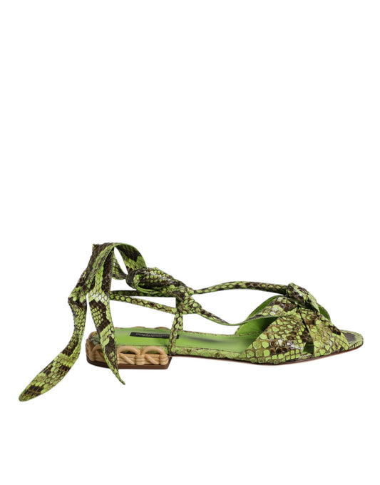 Dolce & Gabbana green snakeskin print ankle-wrap sandals with a woven raffia heel detail.