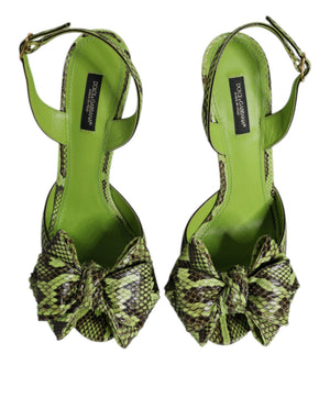 Dolce & Gabbana lime green python leather slingback heels with a prominent bow detail on the toe.