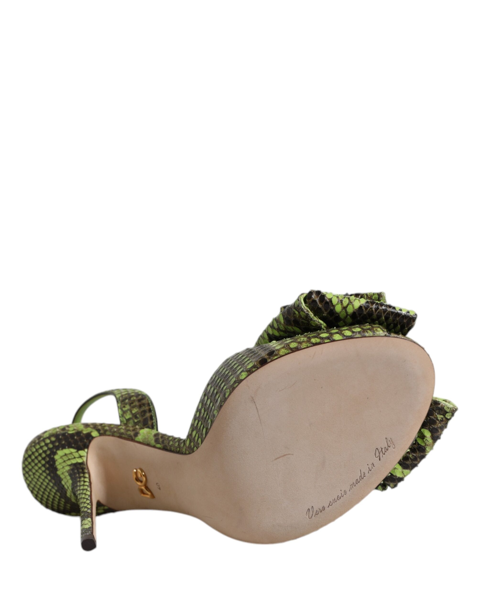 Dolce & Gabbana neon green and black python-embossed leather heeled sandals with a bow detail and leather sole.