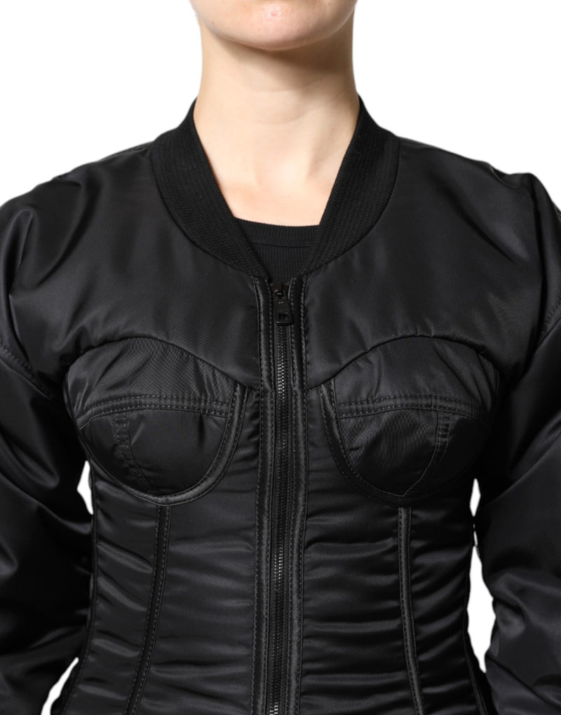 Black nylon full-zip bustier corset jacket with a ribbed collar and structured cups