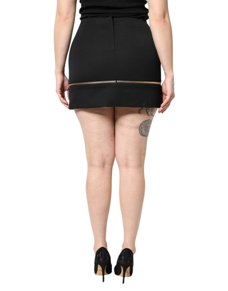 Black wool high waisted mini skirt with a gold zipper accent