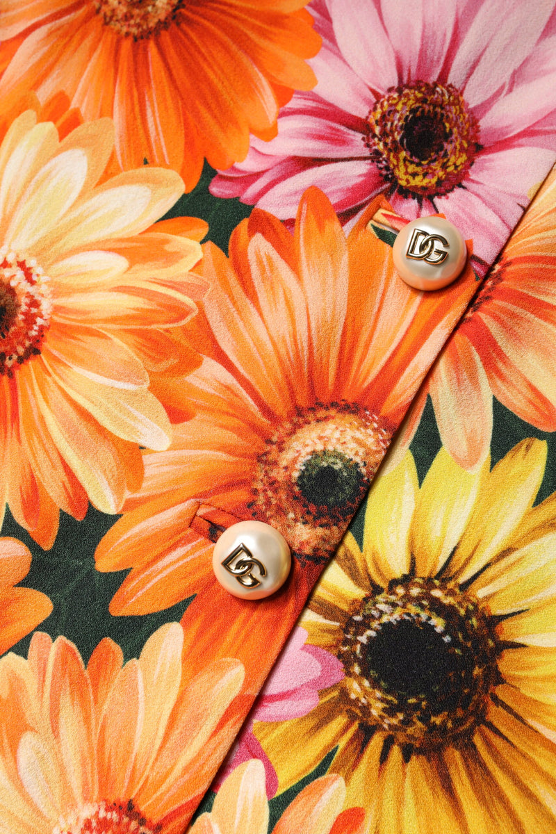 Multicolor floral print mini skirt with pearl buttons featuring gold DG logos