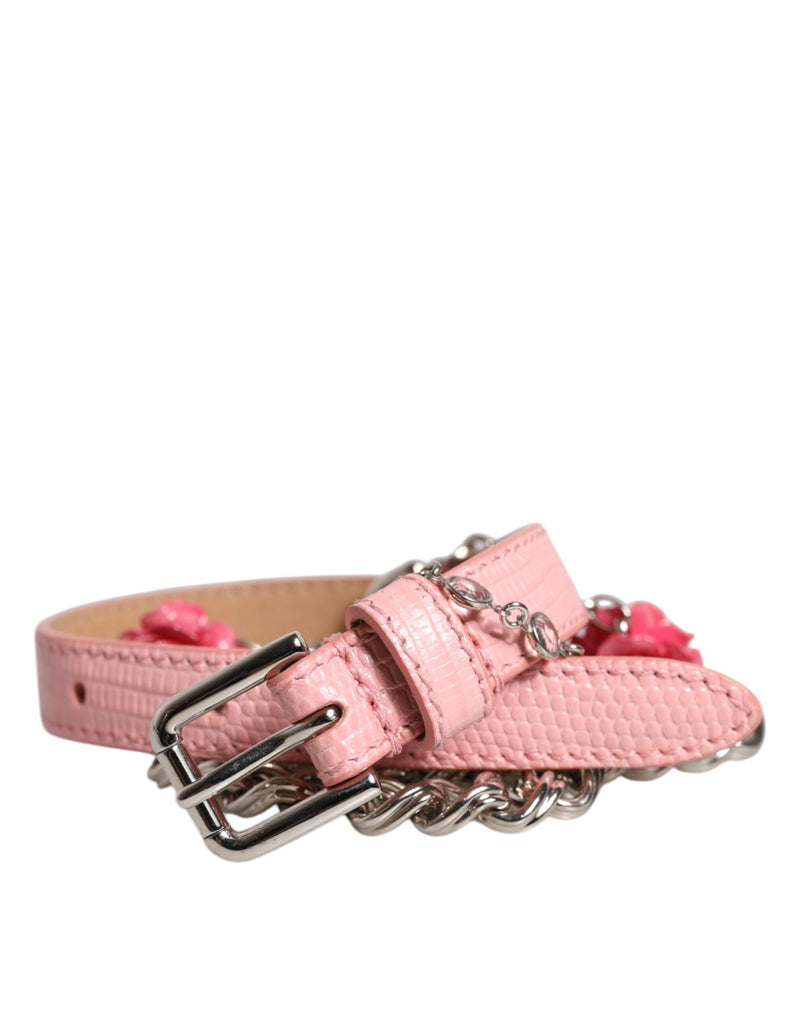 Pink textured leather belt with silver buckle, chain, and rose embellishments