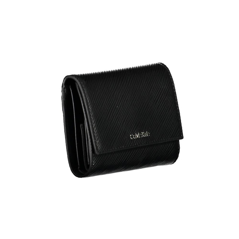 Black textured polyurethane Calvin Klein foldover women's wallet