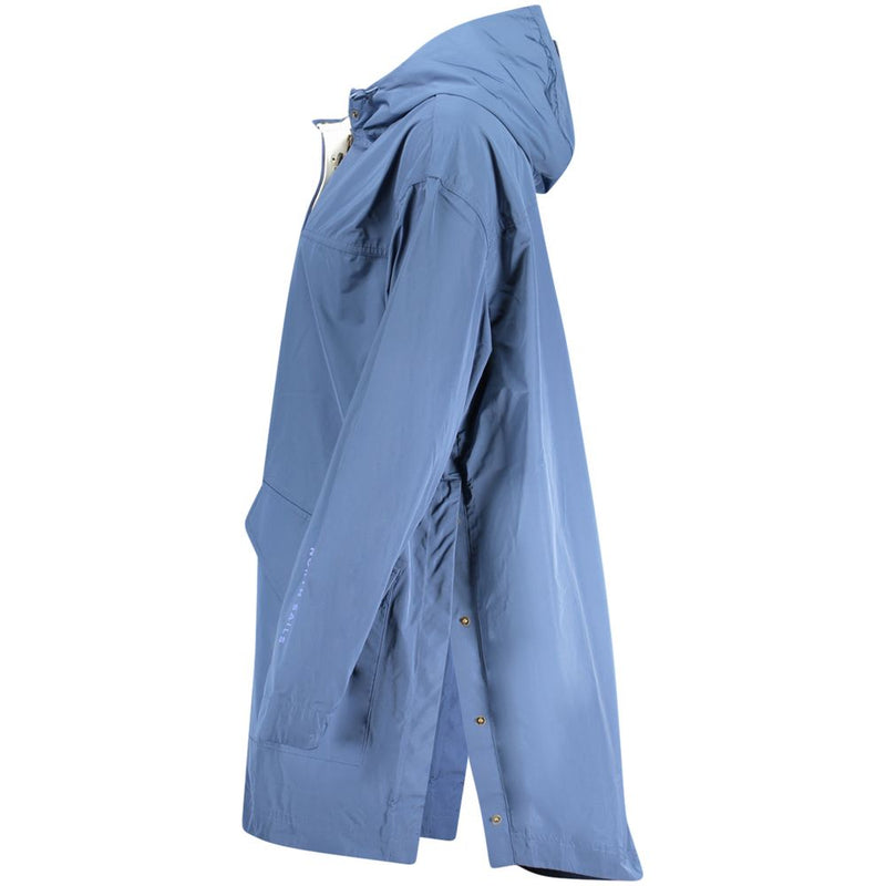 Blue polyester women's parka with a hooded, longline style and side snaps