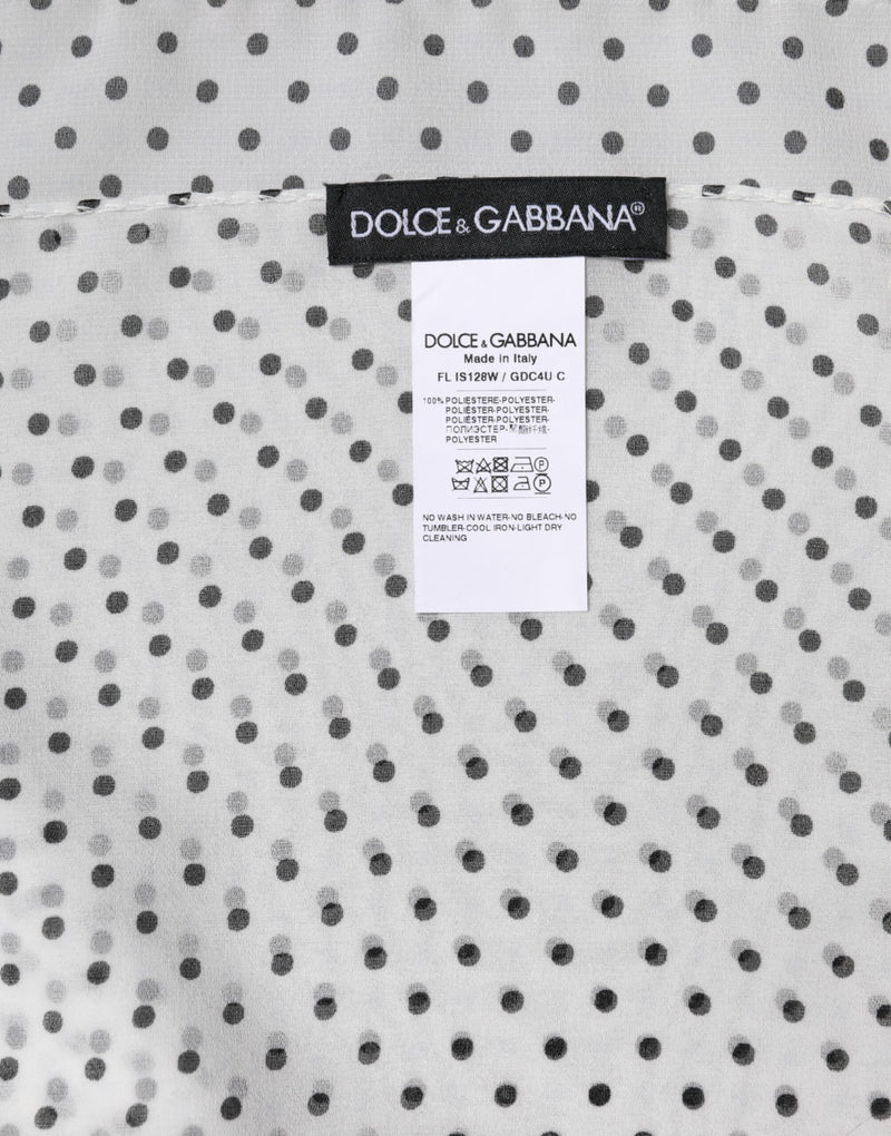 White and black polka dot polyester wrap scarf with brand tag