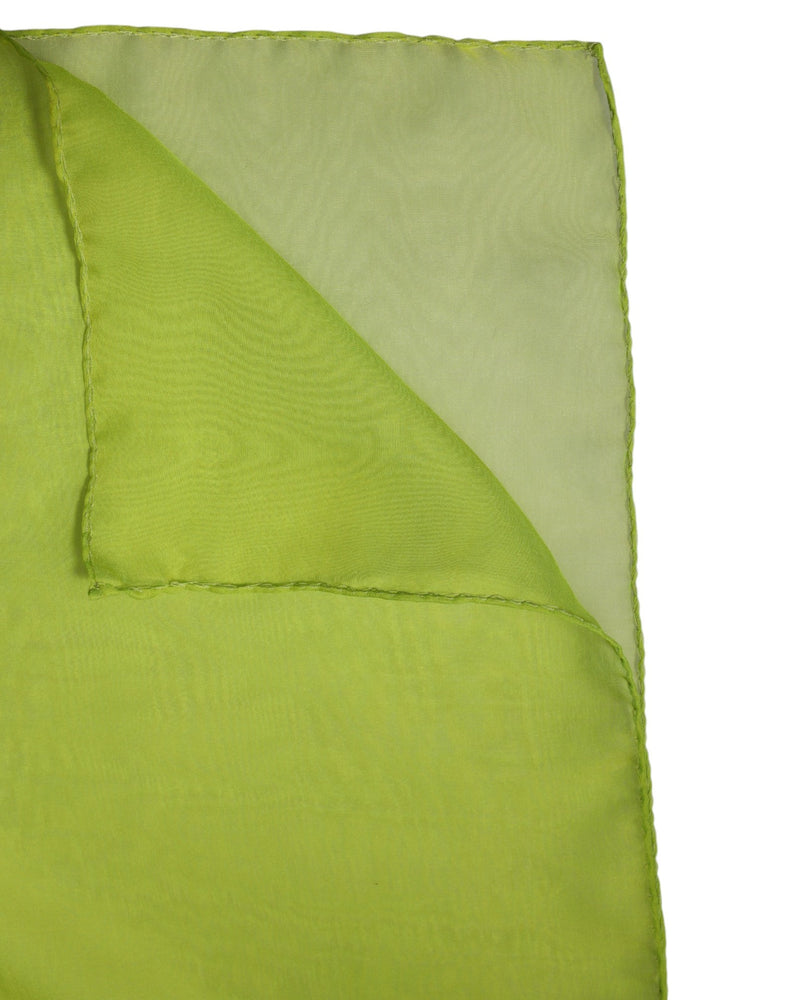 Light green silk wrap scarf folded with visible stitching