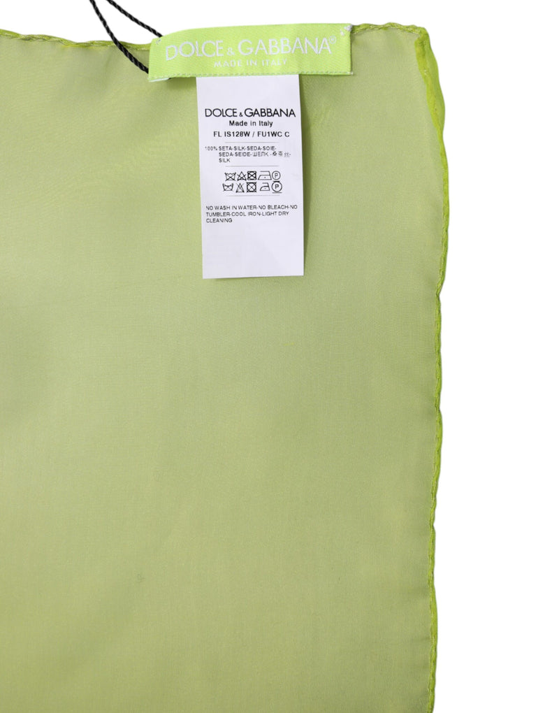 Light green silk scarf with brand tags attached