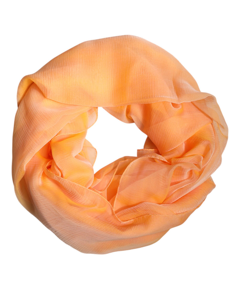 Bright orange lightweight silk wrap scarf gathered in a circle