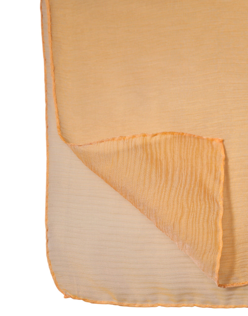 Orange silk rectangle wrap scarf showing sheer textured fabric