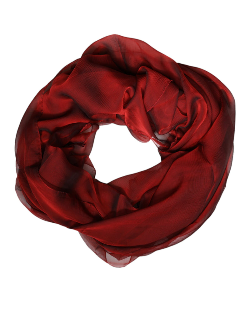 Red silk wrap scarf styled in a soft circular loop