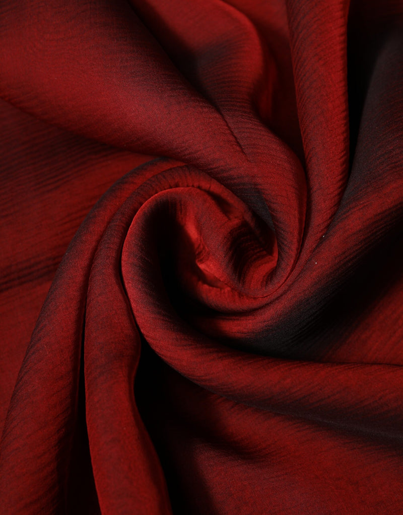 Red silk wrap scarf with textured fabric gathered in soft folds