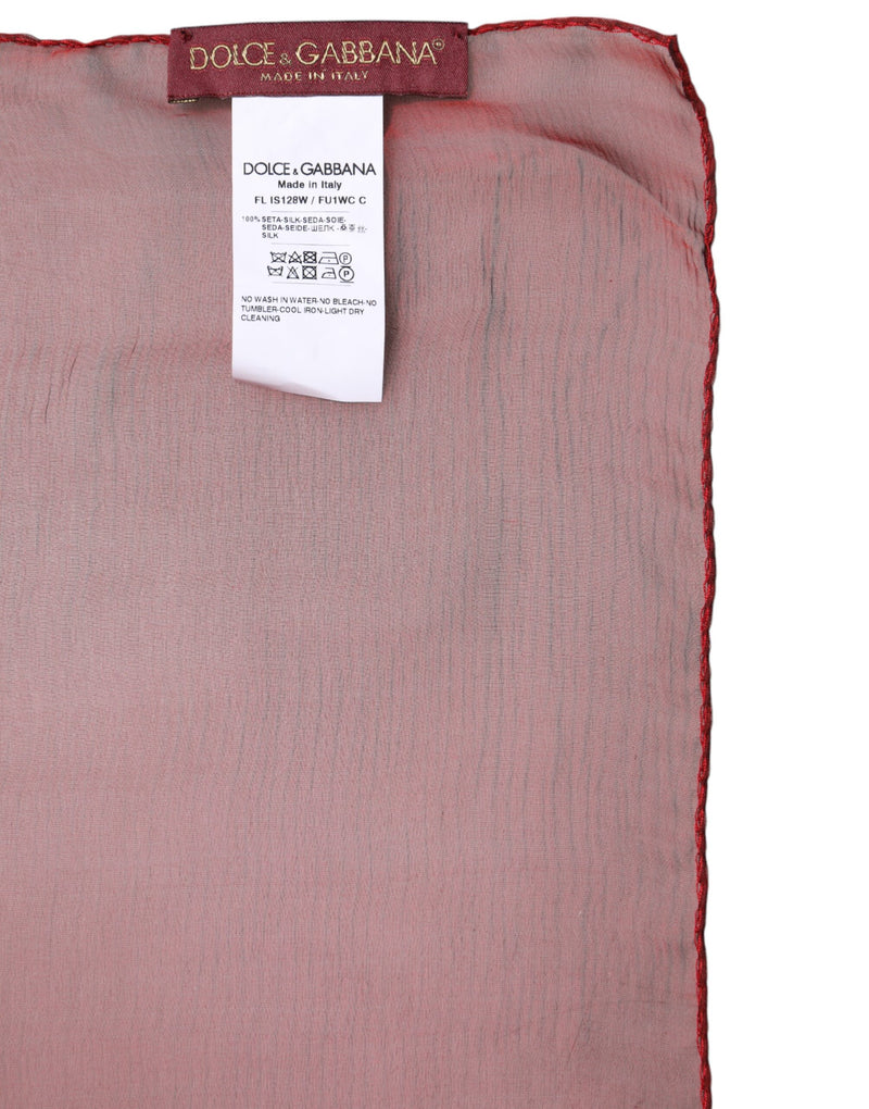 Red silk rectangular wrap scarf with brand tag and care label