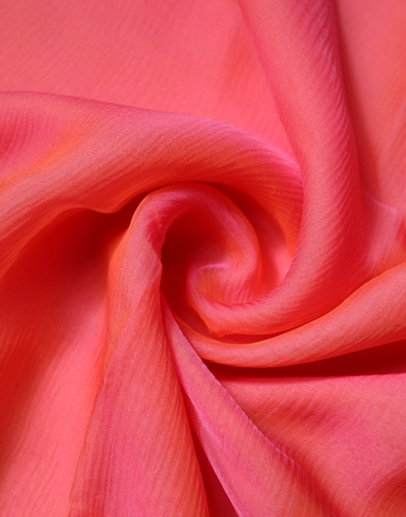 Bright pink silk wrap shawl scarf arranged in soft folds