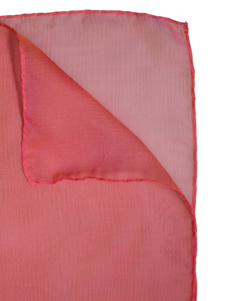 Folded pink silk wrap scarf with finished edges