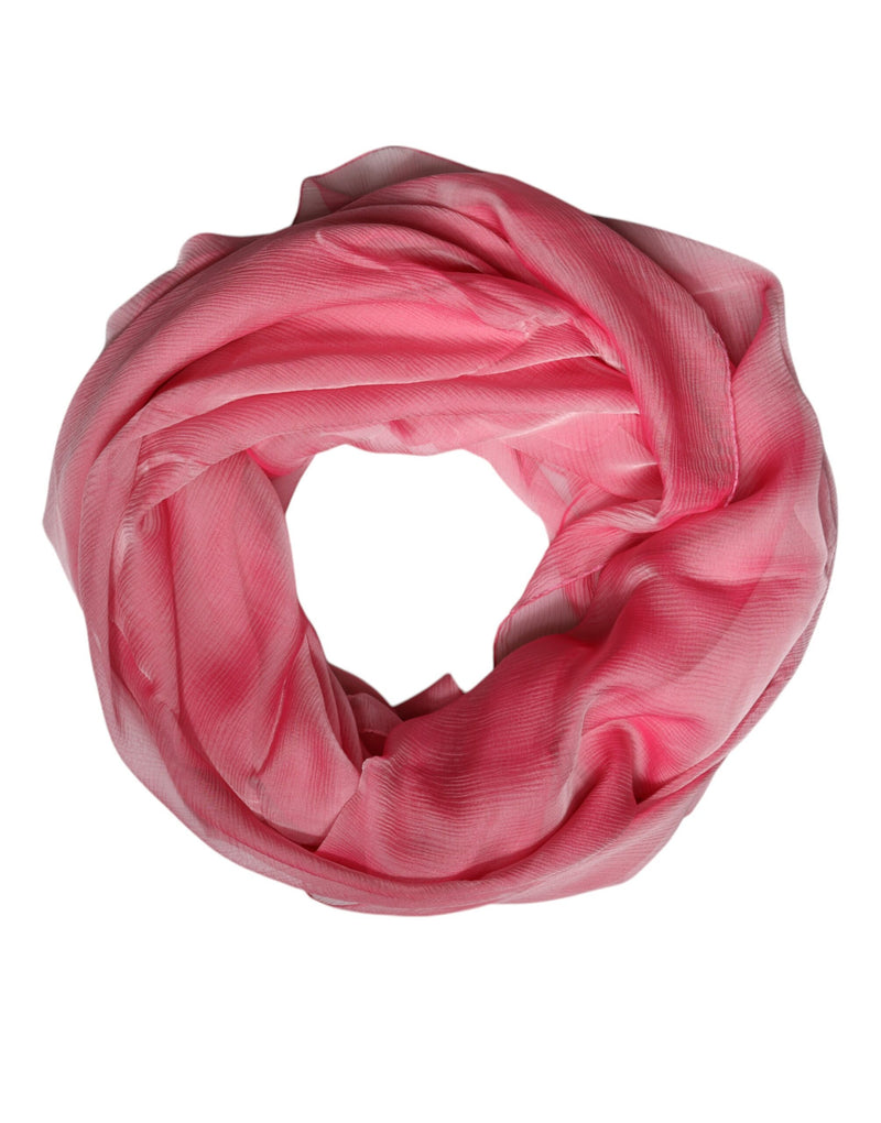 Pink silk wrap scarf coiled in a circle