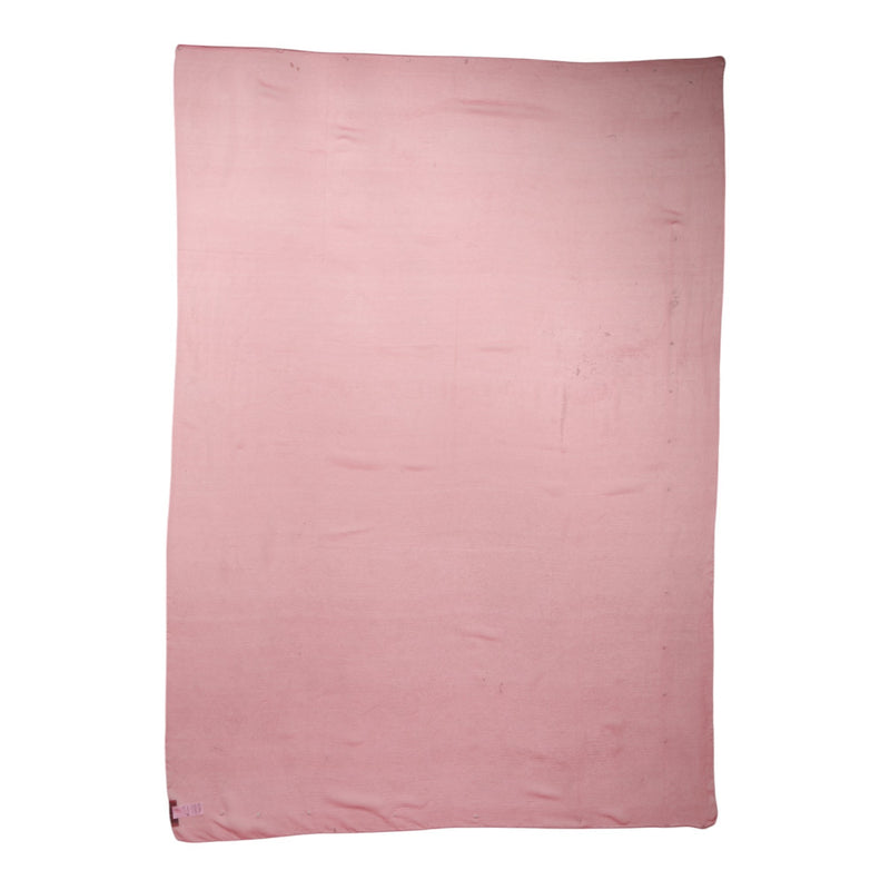 A rectangular pink silk wrap shawl scarf laid flat