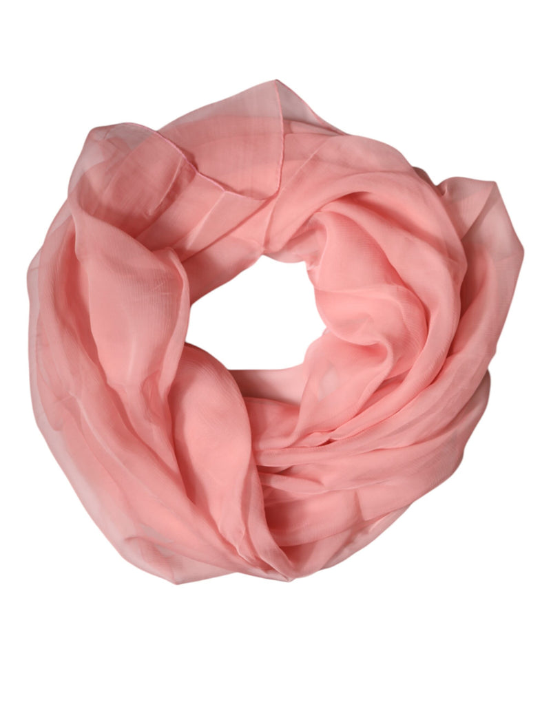 Pink silk wrap scarf coiled in a circle