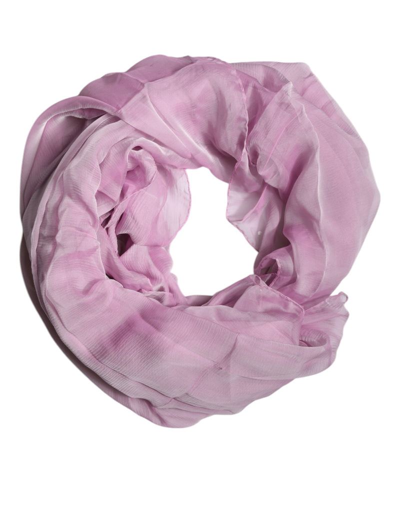 Light pink silk wrap scarf coiled in a circle