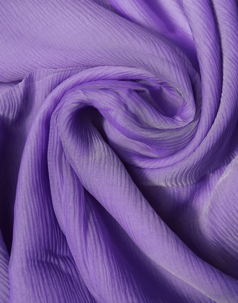 Lightweight purple silk wrap scarf gathered in soft folds