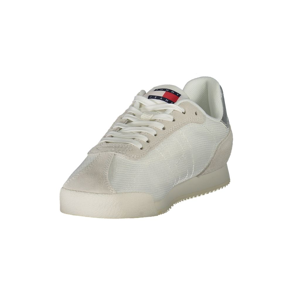 Tommy Hilfiger women's white polyester and suede sneaker in a classic low-top lace-up style.