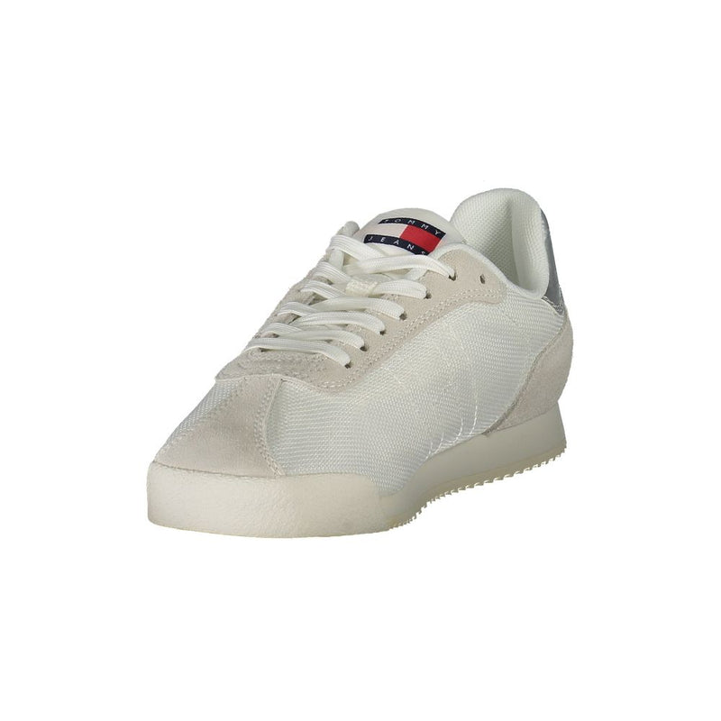 Tommy Hilfiger women's white polyester and suede sneaker in a classic low-top lace-up style.