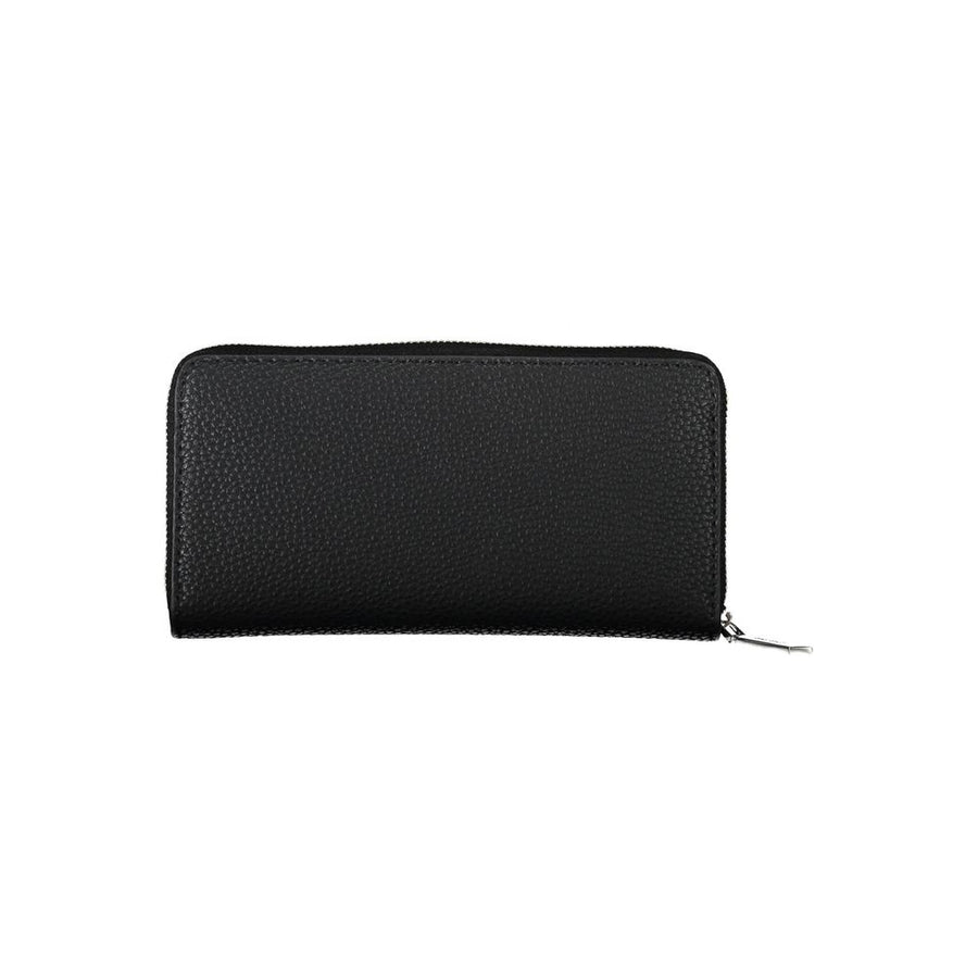 Black textured polyurethane zip-around women's wallet with a snap closure strap and silver hardware