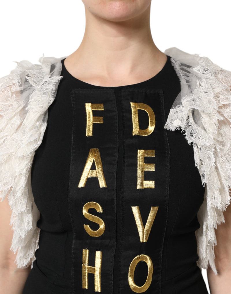 Black mini dress with gold embroidered letters and white lace ruffle shoulders