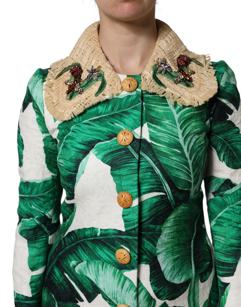 Green and white leaf print jacket with woven straw collar, jewel bug embellishments, and woven buttons