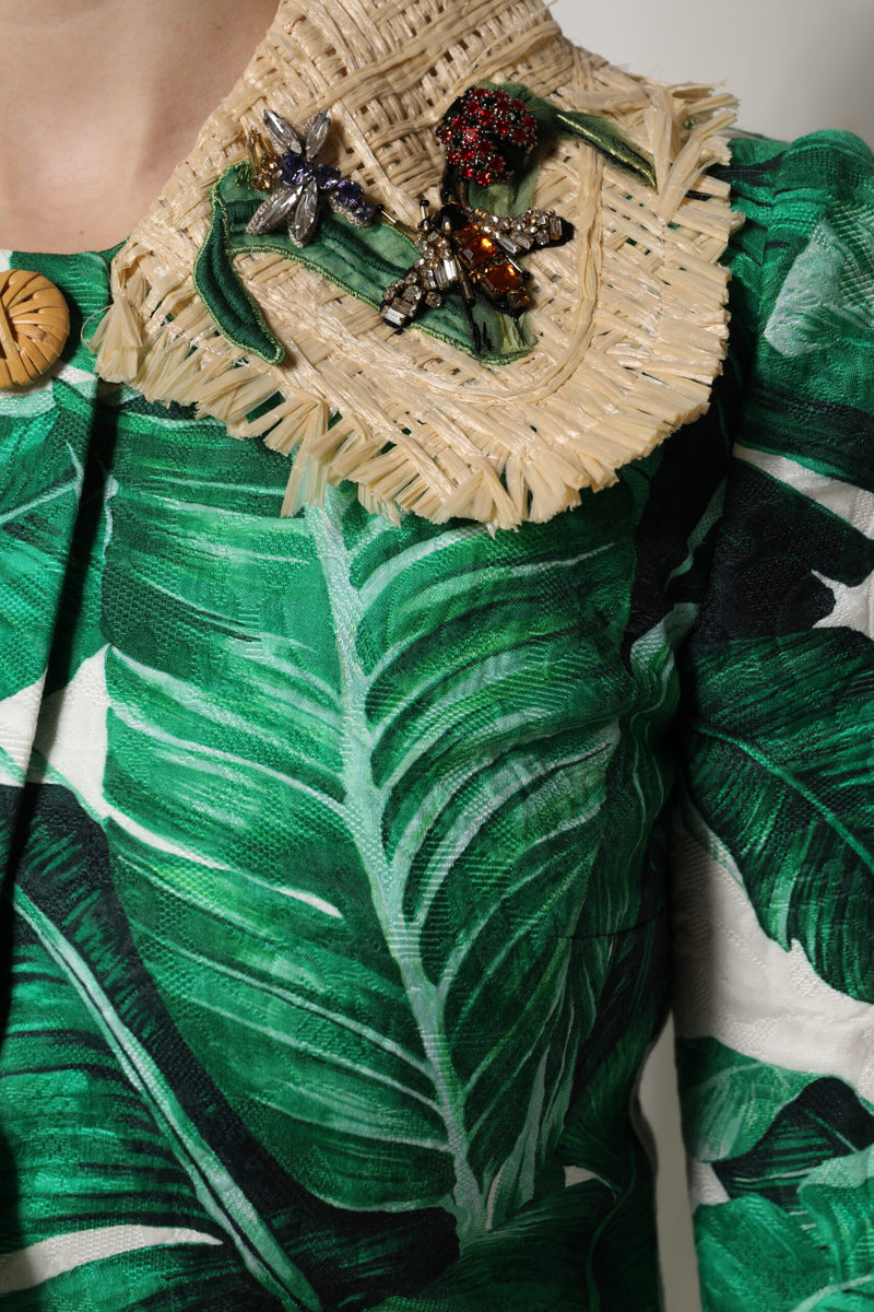 Green leaf print jacket with a straw collar featuring jewel-encrusted insect embellishments