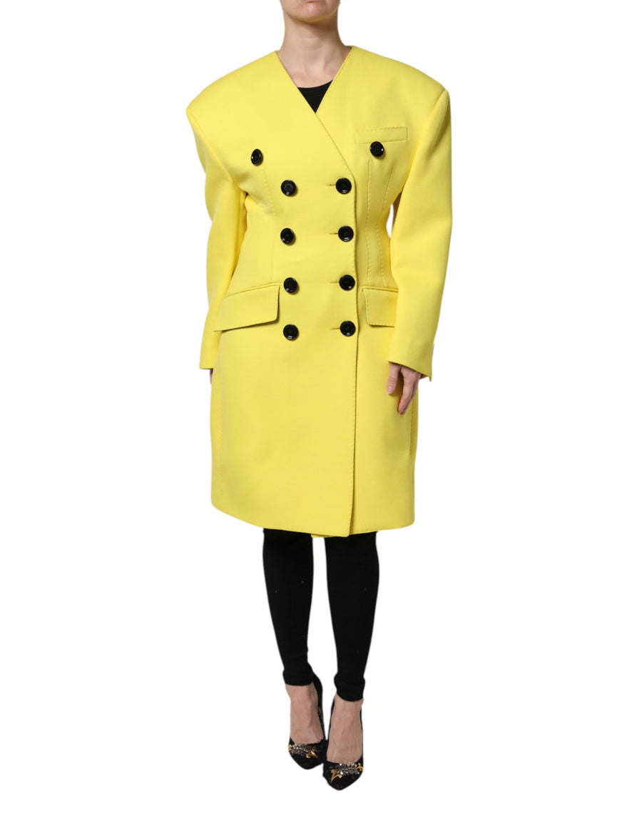 Bright yellow double-breasted trench coat jacket with large black buttons and structured shoulders