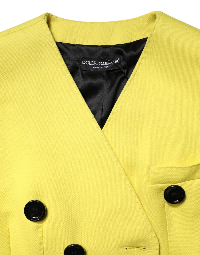 Bright yellow double-breasted jacket with black buttons and a black lining