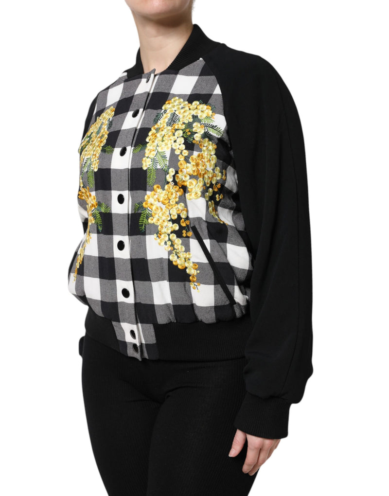 Black and white buffalo check bomber jacket with yellow floral embroidery and black sleeves
