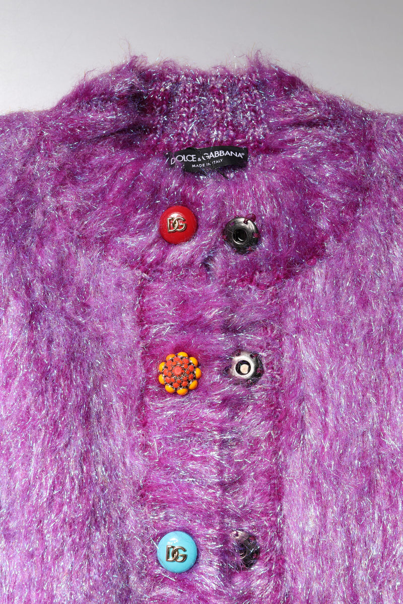 Purple fuzzy knit jacket with colorful decorative buttons and Dolce and Gabbana label