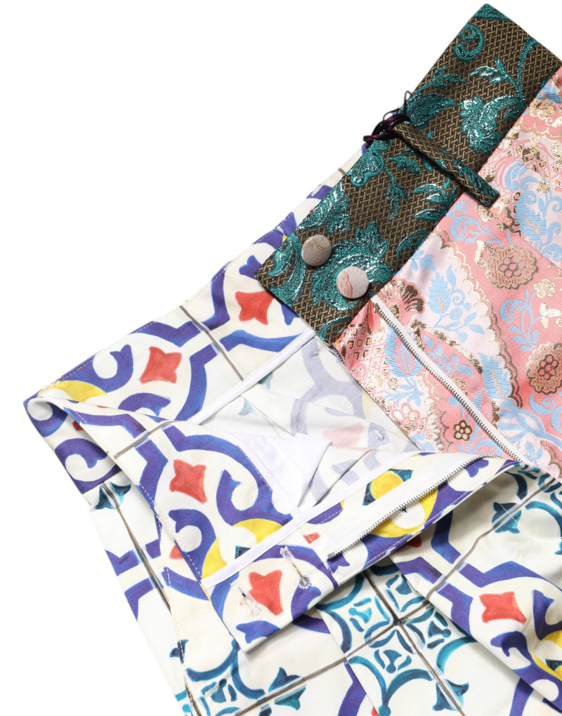 Multicolor patchwork high-waist shorts featuring floral brocade and tile patterns with a front zipper and buttons