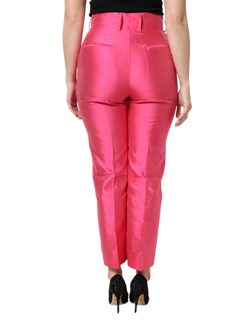 Pink silk high-waist tapered pants viewed from the back