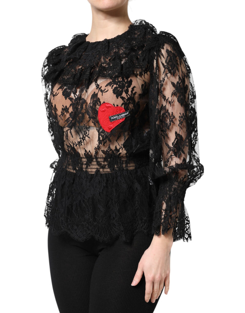 Black lace women's blouse with long sleeves, ruffle collar, and red heart patch on the chest