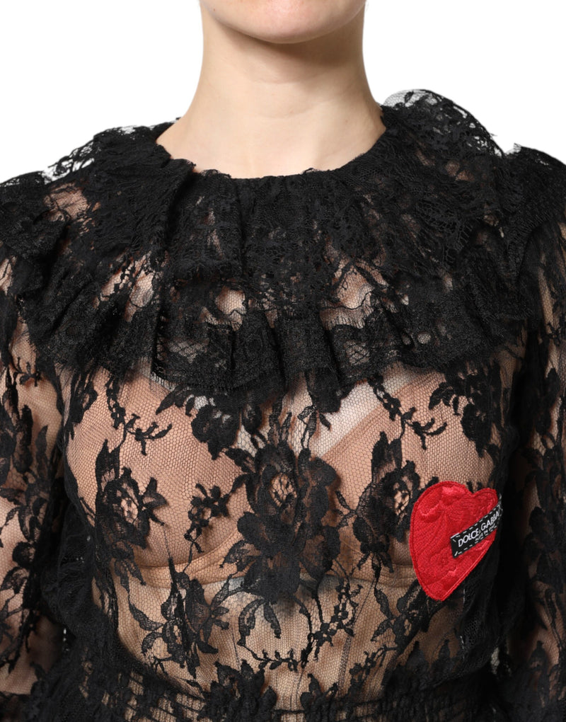 Black floral lace blouse with ruffled collar and a red heart appliqué